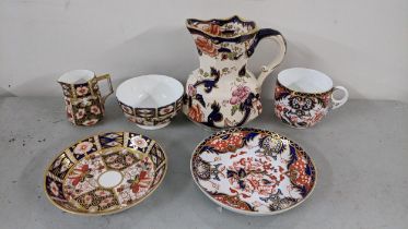 Royal Crown Derby Imari pattern china comprising a cup and saucer, a sugar bowl, a cream jug and a