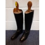 A pair of 20th Century Hawkins black leather riding boots size 6.5E together with a pair of