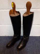 A pair of 20th Century Hawkins black leather riding boots size 6.5E together with a pair of