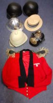 A quantity of mainly replica hats to include a fireman hat, a 1970's Dunn & Co school straw