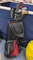 A set of Dunlop golf clubs with golf bag Location: SR