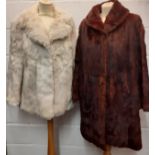 A vintage arctic rabbit fur jacket with internal leather trim to the fastening, 38" chest x 29" long