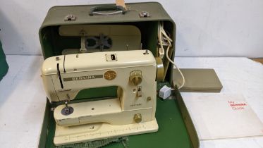 A vintage Bernina Minimatic sewing machine in a case Location: