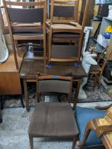 A mid century teak extending dining table on square legs, 71.5cm x 84cm x 76cm (when extended) along