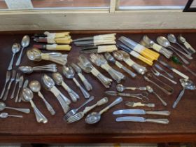 A mixed lot of silver and silver plated cutlery to include a single Mappin & Webb coffee spoon 10.