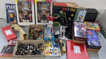 Mixed boxed and loose toys to include a boxed Alps Man in Space figure, Battery operated Moon Rocke