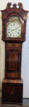 An early 19th century mahogany longcase clock, the case having a broken swan neck pediment and