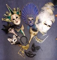 A quantity of Venetian ornate masquerade masks, several stamped Venezia to the reverse. Location:BWR