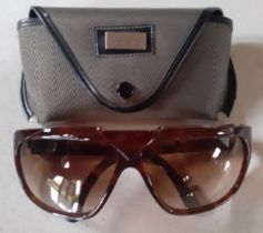 Versace-A pair of Retro 'Basix' brown tortoiseshell effect oversized sunglasses model no:816, having