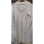 A 19th Century taupe farmer's cotton twill smock, 38" chest x 42" long. Location:Rail