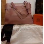 A modern Furla dusty pink leather shoulder bag, as new, having gold tone hardware, 40cm wide x
