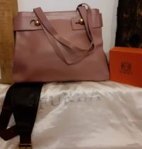 A modern Furla dusty pink leather shoulder bag, as new, having gold tone hardware, 40cm wide x