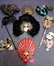 A quantity of Venetian masquerade masks and wall ornaments, to include 2 hand-held masks.