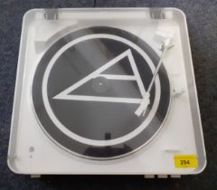 An Audio-Technica white record player. Location:SR