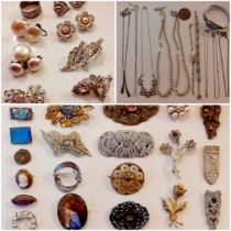 A quantity of costume jewellery to include a Sterling silver morpho brooch, early 20th Century paste