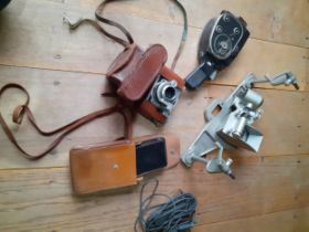 A quantity of vintage photographic equipment to include a Kodak 35 camera and a Kodak II folding