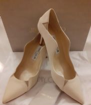 Jimmy Choo-A pair of cream textured Tamika 100 leather shoes with 7cm kitten heels, inset taupe dart