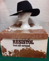 A Resistol Western black beaver 'Long Oval' Stetson, size 7 and 1/8 in branded hat box.