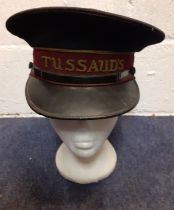 A vintage Madame Tussauds cap manufactured by Ug's Co Ltd.