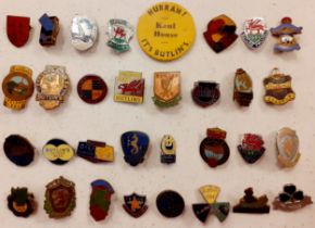 A quantity of 32 vintage Butlin's enamelled and other badges dated 1948-68 to include '2nd Week' and