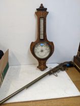 A Edwardian inlaid walnut barometer, shield shaped case, with thermometer, along with an English
