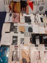 A quantity of approximately 57 packets of tights and stockings, unworn and in original packaging