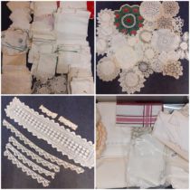 A large quantity of vintage table linen to include early 20th Century examples with crotchet trim,