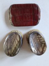 Two silver hand brushes and a Circa 1900 brown crocodile wallet with silver bat wing ends stamped