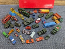 A collection of mixed vintage Dinky, Corgi, Matchbox and other model vehicles to include...