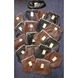A quantity of 28 x 1930's/40's black and brown leather clutch bags A/F with silver tone clasps and a