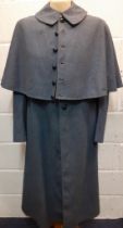 A 1950's blue woollen coat in the style of a Staunton Military Academy overcoat, 40" chest x 45"