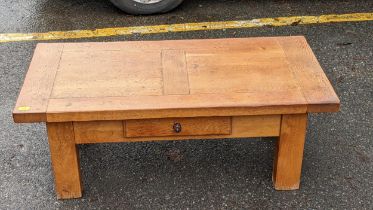 A modern French style oak coffee table, with a drawer on square legs Location: CON