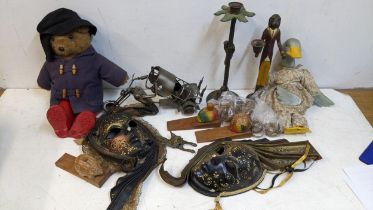 Collectables to include Paddington Bear teddy, a Jemima Puddleduck doll, napkin rings, two masks,