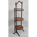 A Mahogany Three Tier Cake Stand with Bobbin Knopped Supports, 90cms High