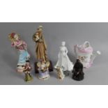 A Collection of Various Resin and Ceramic Figural Ornaments