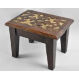 An Early/Mid 20th Century Rectangular Stool with Tapering Supports, Top with Deep Carved Design,