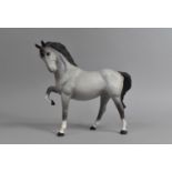 A Beswick Horse, Standing Grey with Foreleg Raised, 1549, Matt