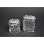 Two Silver and Glass Dressing Table Pots, Both with Scrolled Decoration, 7.5cm and 9cm high