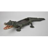 A Reproduction Cold Painted Bronze Novelty Match Holder in the Form of a Crocodile, 23cms Long