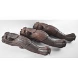 Three Carved Wooden Supports in the Form of Lions with Tongues Out, 39cms High