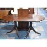 A String Inlaid Mahogany Regency Style Twin Pedestal Dining Room Table with Extra Leaf, 160cms