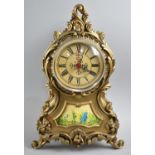 A Decorative Resin Mantel Clock having Quartz Movement in the French Rococo Style