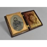 A Victorian Daguerreotype in Moulded Hinged Case with Scrolled Design in Relief, Some Condition