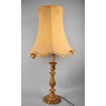 A Gilt Table Lamp of Moulded Form with Shade, Lamp 38cms High and with Shade (AF) 71cms