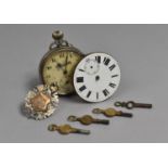 A Collection of Four Various Pocket Watch Keys, a Silver Fob, Champion Pocket Watch and a Further