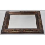 A Framed Wall Mirror with Decorative Moulded Frame, 70x61cms Overall