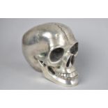 A Silver Plated Study of a Skull with Articulated Jaw, 9cms Wide