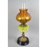 A Victorian Brass and Opaque Glass Oil Lamp, Opaque Green Glass Reservoir with Moulded Organic