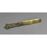 An Early 20th Century Brass Page Turner with Shaped Handle having Floral Motif and Scrolled