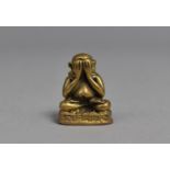 A Small Bronze Travel Icon, Study of Buddha in Seated Position with Hands on Eyes, 2cms High